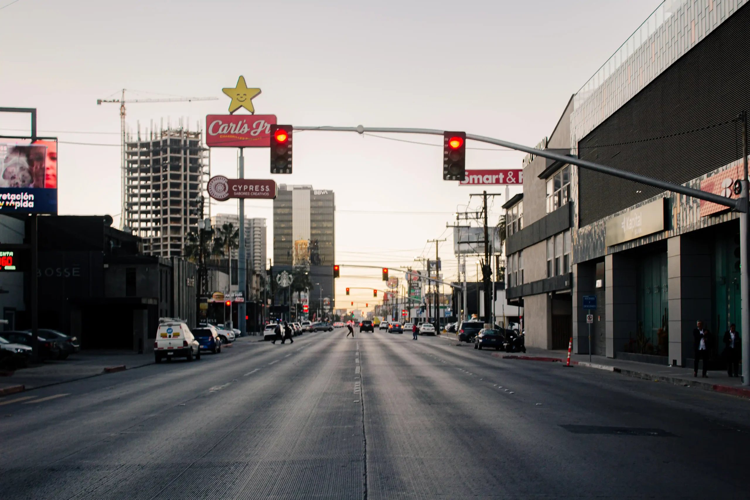Liposuction in Tijuana, Mexico 24 Street view of Boulevard Agua Caliente in Tijuana's Golden Zone, showing modern infrastructure, restaurants, and hotels near major plastic surgery clinics.