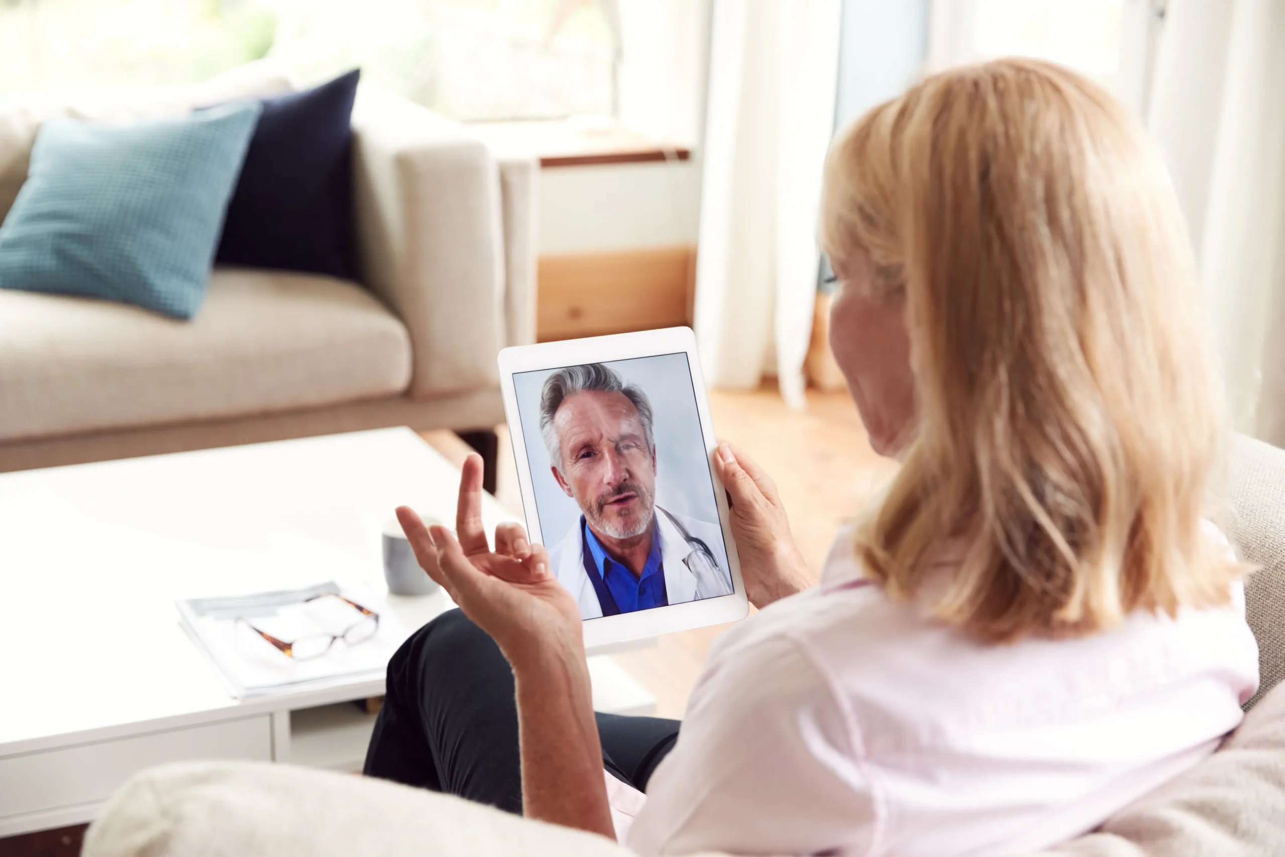 Patient Process 15 A patient having a virtual consultation to learn about the patient process for surgery in Mexico and the medical travel process Tijuana.