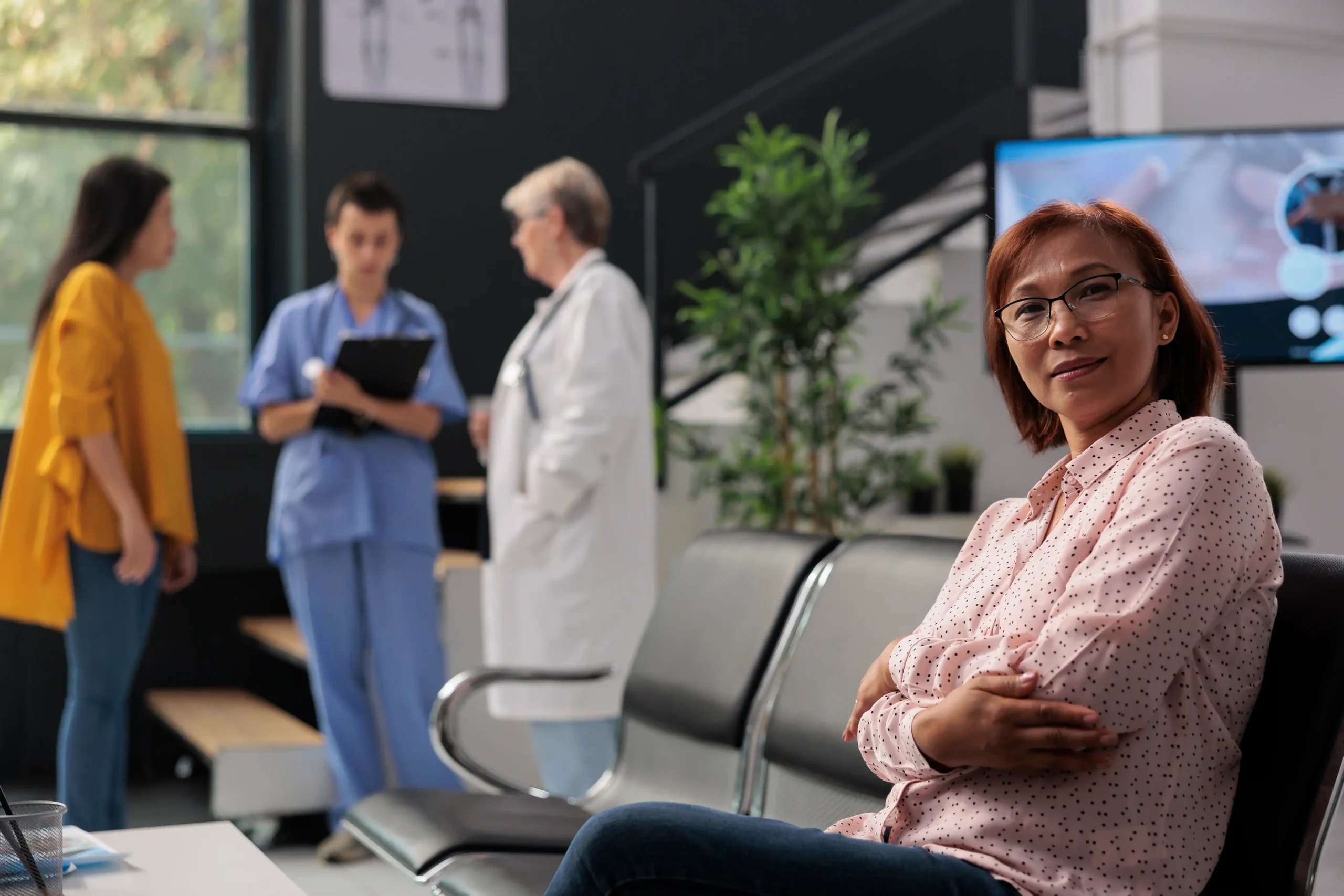 Patient Stories 17 A satisfied patient waiting in a modern clinic, reflecting positive medical tourism reviews and testimonials for surgery in Mexico.