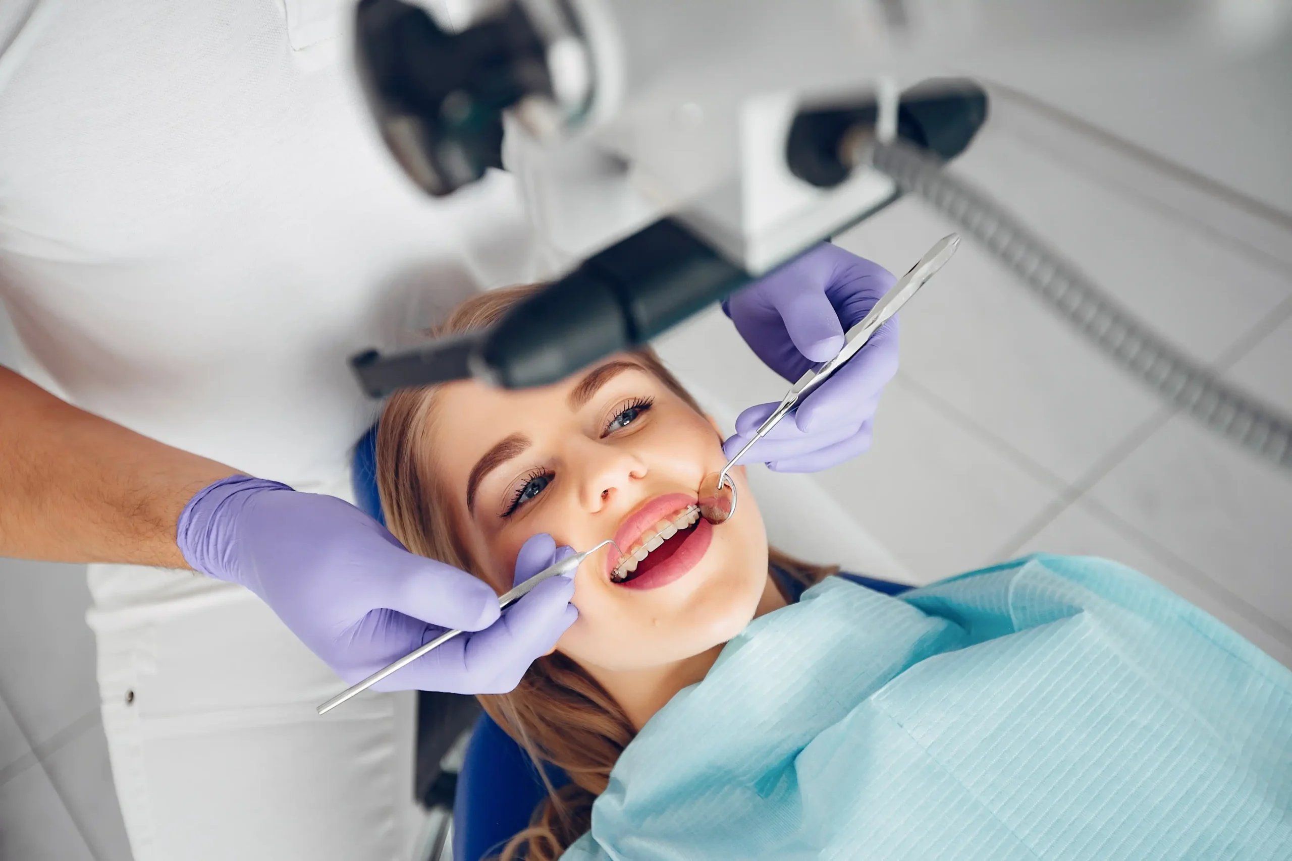 Dental Care in Tijuana, Mexico 16 A patient undergoing an exam with advanced tools, showcasing modern cosmetic and restorative dentistry in Mexico.