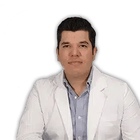 Vetted Doctors in Tijuana | Health & Wellness Bazaar 20 Dr. Cortez, a hair restoration specialist in Tijuana, Mexico, performing advanced FUE and DHI hair transplant procedures at Health and Wellness Bazaar.