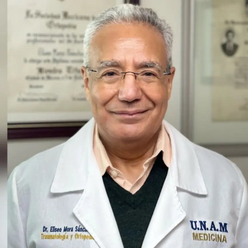 Stem Cell Therapy in Tijuana, Mexico 14 Dr. Eliseo Mora Sánchez, a highly rated orthopedic surgeon in Tijuana, Mexico, wearing his medical coat from UNAM.