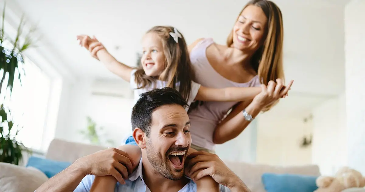 Penis Enlargement Surgery Before and After: What Men Really Experience 3 A happy, smiling family at home representing the confidence and quality of life results following penis enlargement in Tijuana.