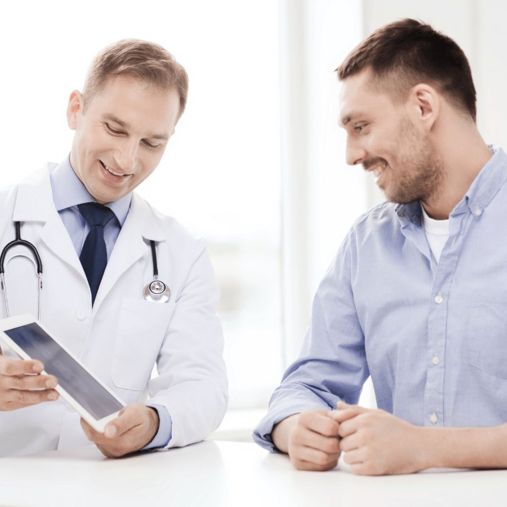 Smiling doctor consulting a patient about general surgery in Tijuana, Mexico, offering affordable and high-quality surgical care