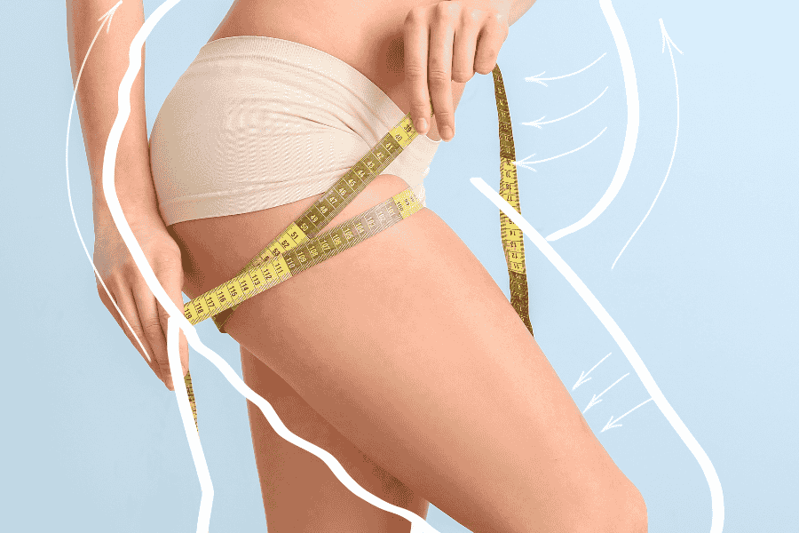 Close-up of a woman’s thigh with a measuring tape, illustrating the benefits of a thigh lift procedure in Tijuana, Mexico, at Health & Wellness Bazaar.