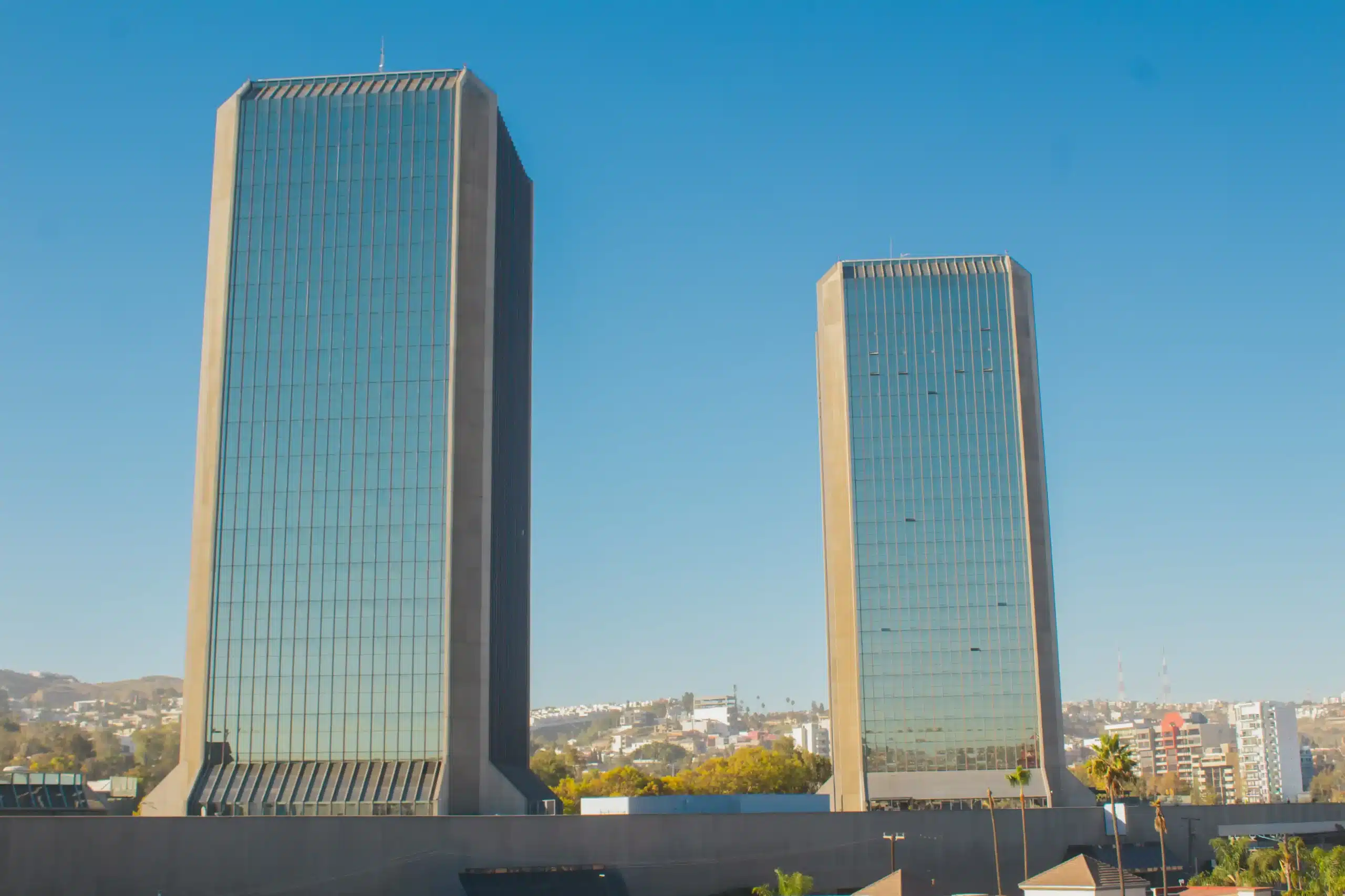 Skin Removal in Tijuana, Mexico 19 Panoramic aerial view showing modern skyscrapers and urban development of the business district in Tijuana, Mexico, a hub for medical tourism.