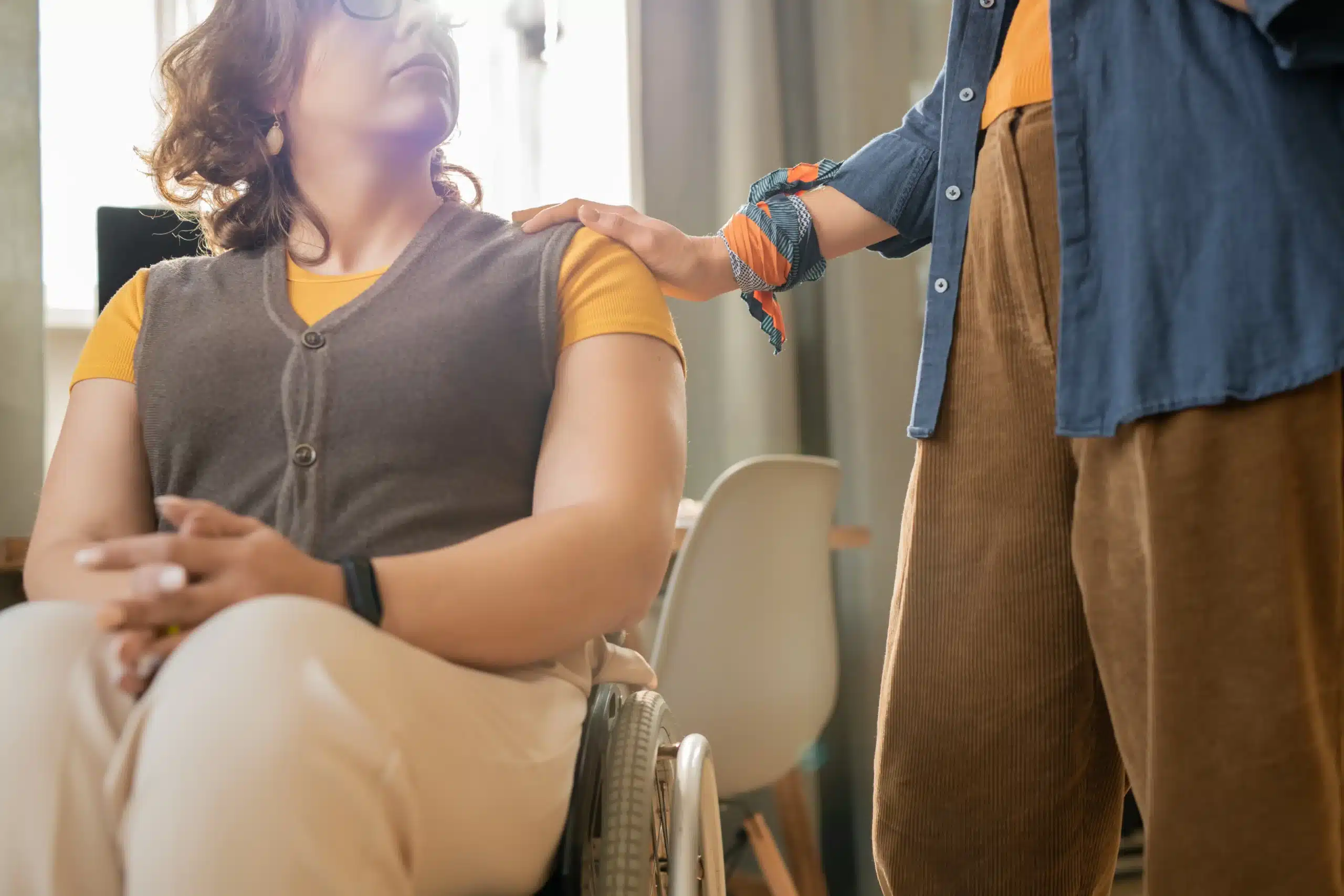 Arm Lift in Tijuana, Mexico 21 Medical coordinator offering a comforting hand to a patient discussing Arm Lift surgery in Tijuana, providing emotional support for brachioplasty candidates.