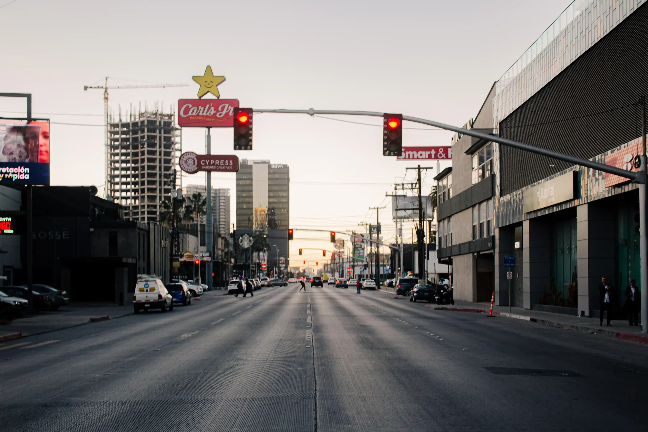Liposuction in Tijuana, Mexico 23 Street view of Boulevard Agua Caliente in Tijuana's Golden Zone, showing modern infrastructure, restaurants, and hotels near major plastic surgery clinics.