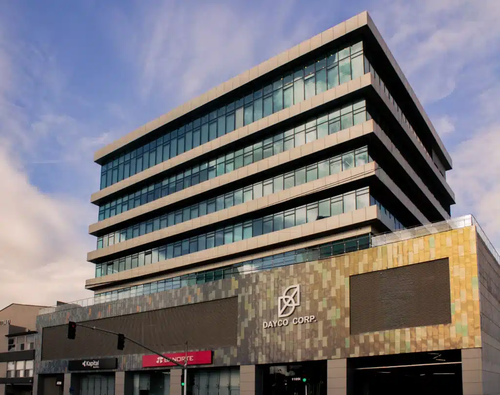 Breast Augmentation In Tijuana, Mexico 12 Exterior view of the modern Dayco Corp tower in Tijuana, housing elite medical tourism clinics and board-certified surgeons in a secure district.