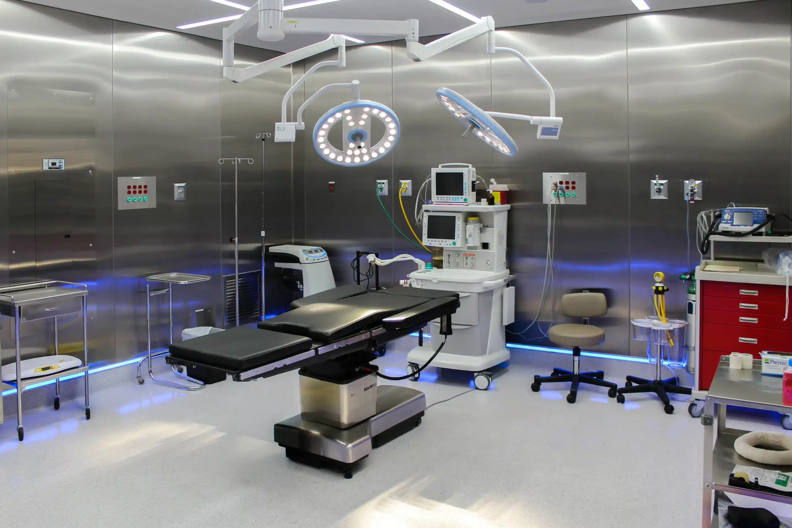 Brazilian Butt Lift in Tijuana, Mexico 12 Modern, stainless-steel operating room in Tijuana featuring advanced surgical lights and anesthesia equipment, ensuring a sterile environment for Brazilian Butt Lift surgery.