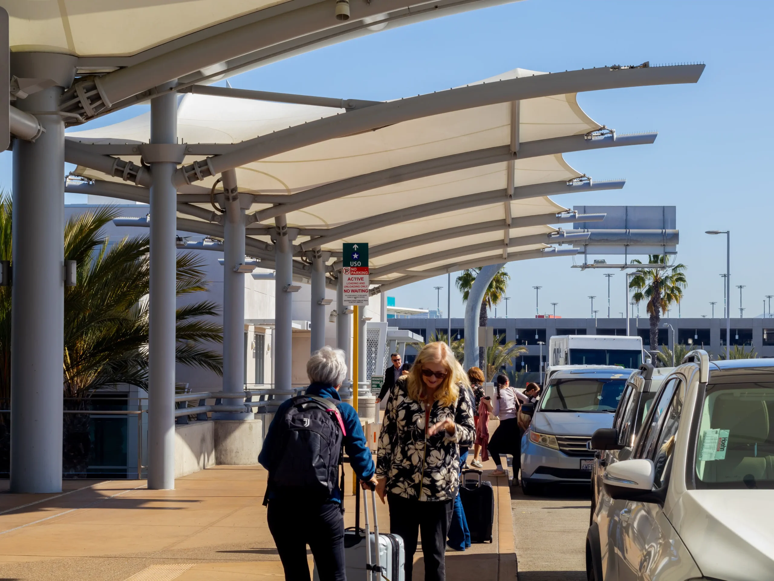 Patient Process 14 Patients arriving with luggage at a transport hub in Tijuana, illustrating the medical travel process for surgery in Mexico.