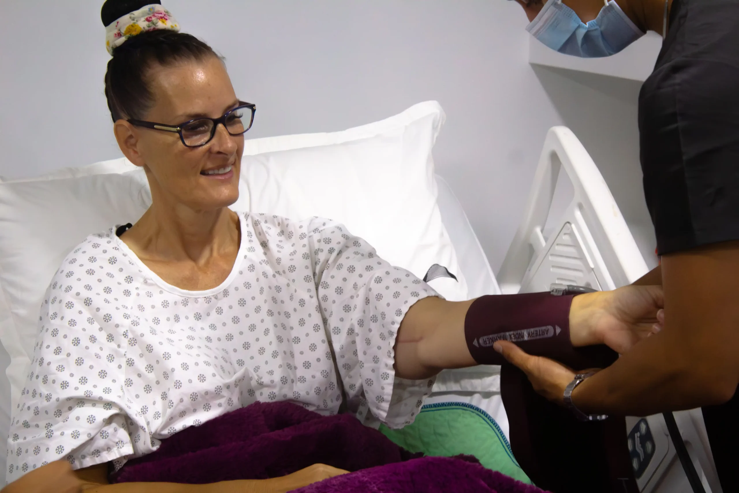 Patient Process 13 A medical professional monitoring a patient during the medical travel process Tijuana after a successful procedure.