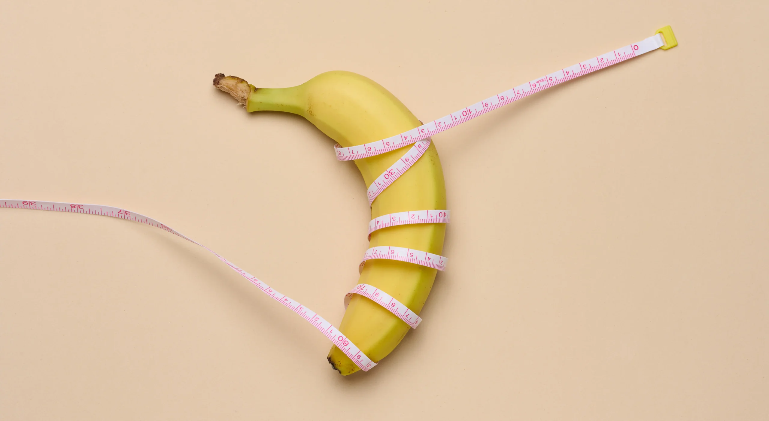 Penis Enlargement in Tijuana, Mexico 11 A symbolic image of a banana with a measuring tape, representing penis lengthening surgery in Tijuana and penis thickening surgery in Tijuana.