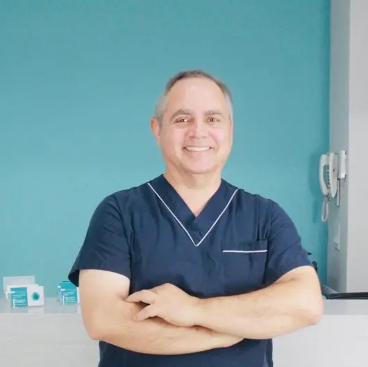 IUI Fertility in Tijuana, Mexico 12 Dr. Oscar Valle, a leading fertility specialist in Tijuana, Mexico, smiling in his medical office.